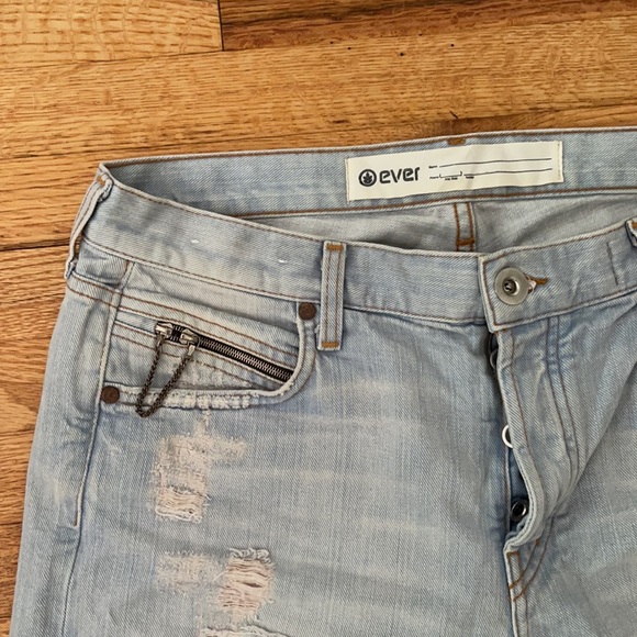 Distressed Denim Cutoff Shorts with Chain Detail and Rolled Hem - Picture 2 of 7